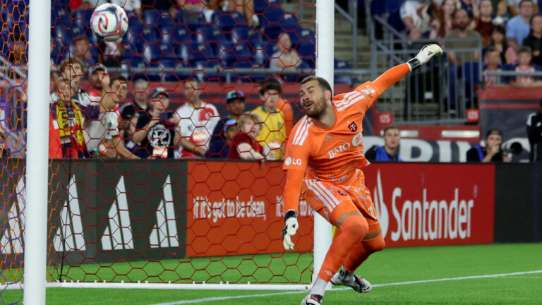 Toronto FC goalkeeper Luka Gavran deflects the ball from the net in the first half of an MLS soccer match against the New England Revolution, Wednesday, July 22, 2026, in Foxborough, Mass. (Mark Stockwell/AP)