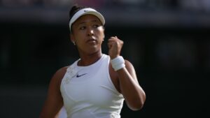 Naomi Osaka of Japan celebrates winning a point against Aryna Sabalenka of Belarus in their fourth round women's singles match at the Wimbledon Tennis Championships in London, Sunday, July 5, 2026. (AP Photo/Brian Inganga)