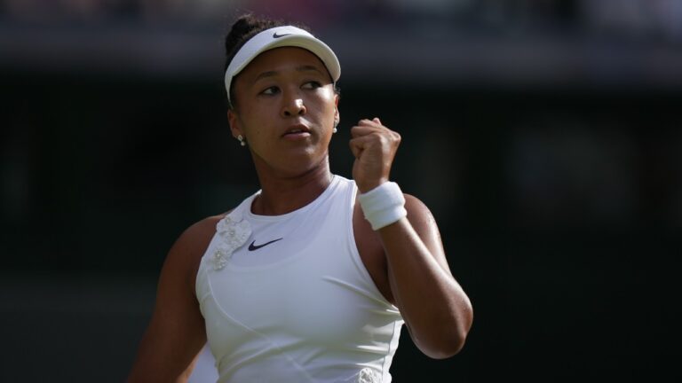 Naomi Osaka of Japan celebrates winning a point against Aryna Sabalenka of Belarus in their fourth round women's singles match at the Wimbledon Tennis Championships in London, Sunday, July 5, 2026. (AP Photo/Brian Inganga)