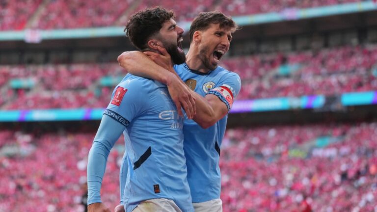 Manchester City's Josko Gvardiol, left, and Ruben Dias celebrate after a goal during a match between Nottingham Forest and Manchester City at Wembley stadium in London, on April 27, 2025. (Kirsty Wigglesworth/AP)
