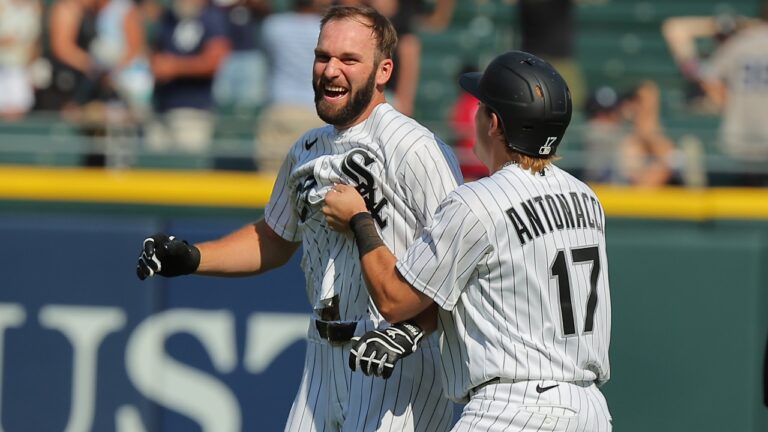 Chicago White Sox' Tristan Peters, left, celebrates with Sam Antonacci after Peters' bases loaded walk allowed the game-winning run to score in the 11th inning of a baseball game against the New York Yankees, Thursday, July 30, 2026, in Chicago. (AP Photo/Melissa Tamez)