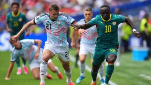 Belgium's Timothy Castagne (21) and Senegal's Sadio Mane (10) run for the ball during the World Cup round of 32 soccer match between Belgium and Senegal in Seattle, Wednesday, July 1, 2026. (Manu Fernandez/AP)