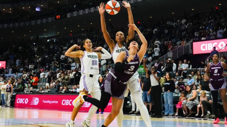 Toronto Tempo guard Marina Mabrey (3) is fouled as she drives past Golden State Valkyries Kiah Stokes (41) and Veronica Burton (22) during first half WNBA basketball action in Toronto on Wednesday, July 8, 2026. (Chris Young/CP)