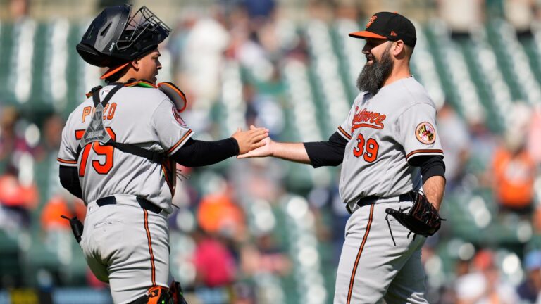 Baltimore Orioles catcher Yohel Pozo celebrates with pitcher Andrew Kittredge (39) after the final out during the 12th inning of a baseball game against the Detroit Tigers Wednesday, July 29, 2026, in Detroit. (AP Photo/Paul Sancya)