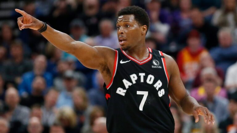 Toronto Raptors guard Kyle Lowry (7) directs his team in the first half during an NBA basketball game against the Utah Jazz, Monday, March 9, 2020, in Salt Lake City. (Rick Bowmer/AP)