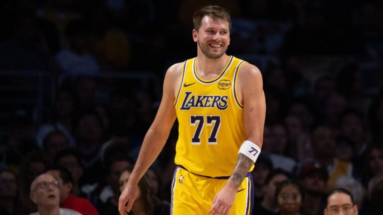 Los Angeles Lakers guard Luka Doncic smiles during an NBA basketball game against the Denver Nuggets in Los Angeles, Saturday, March 14, 2026. (AP Photo/Kyusung Gong)