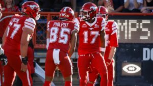 Calgary Stampeders' Dejon Brissett (17) celebrates his touchdown with teammates during first half CFL football action against the Toronto Argonauts in Calgary, Thursday, July 2, 2026.THE CANADIAN PRESS/Jeff McIntosh