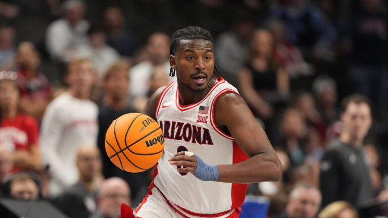 Arizona guard Jaden Bradley drives during the second half of the NCAA college championship basketball game against Houston at the Big 12 Conference tournament Saturday, March 14, 2026, in Kansas City, Mo. (AP Photo/Charlie Riedel)