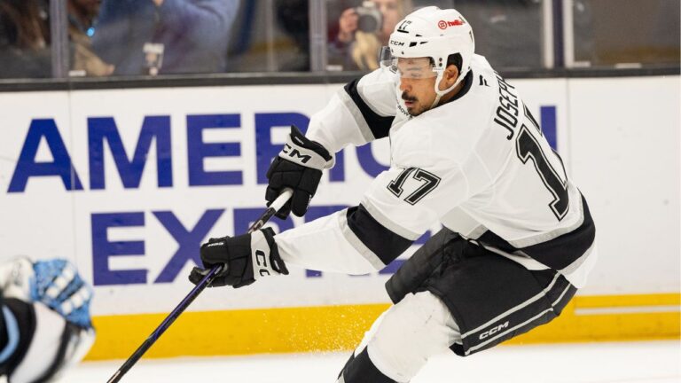 Los Angeles Kings right wing Mathieu Joseph (17) controls the puck to the goal against Utah Mammoth goaltender Karel Vejmelka (70) during the second period of an NHL hockey game, Sunday, March 22, 2026, in Salt Lake City. (AP Photo/Melissa Majchrzak)