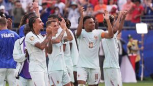 France's Kylian Mbappe (10) and teammates celebrate after winning the World Cup quarterfinal soccer match between France and Morocco in Foxborough, Mass., near Boston, Thursday, July 9, 2026. (AP Photo/Charles Krupa)