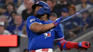 Toronto Blue Jays' Vladimir Guerrero Jr. (27) hits a single against the Chicago White Sox during first inning MLB baseball action in Toronto, Saturday, July 18, 2026. THE CANADIAN PRESS/Jon Blacker