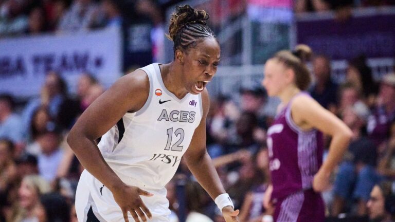 Las Vegas Aces' Chelsea Gray (12) reacts after scoring against the Toronto Tempo during first half WNBA basketball action in Toronto, on Monday, July 20, 2026. THE CANADIAN PRESS/Sammy Kogan