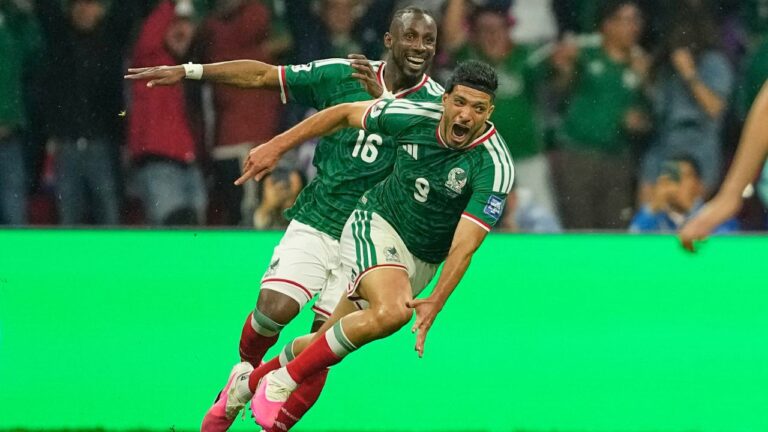 Mexico's Raul Jimenez (9) celebrates with teammate Julian Quinones (16) after scoring his team's second goal during the World Cup round of 32 soccer match between Mexico and Ecuador in Mexico City, Tuesday, June 30, 2026. (AP Photo/Natacha Pisarenko)