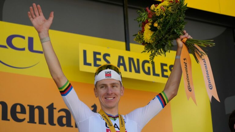 Slovenia's Tadej Pogacar celebrates on the podium after winning the third stage of the Tour de France cycling race with start in Granollers and finish in Les Angles , France, on Monday, July 6, 2026. (Mosa'ab Elshamy/AP)