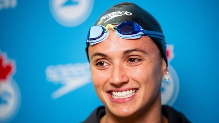 Kylie Masse speaks to media following her win in the women's 50m backstroke final at the Canadian Swimming Trials in Montreal, on Monday, July 6, 2026. (Christopher Katsarov/CP)