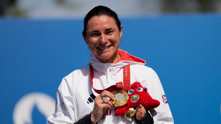 Britain's Sarah Storey celebrates after winning gold at the 2024 Paralympics, on Friday, Sept. 6, 2024, in Clichy-sous-Bois, France. (Aurelien Morissard/AP)