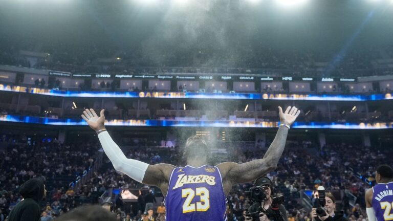 LeBron James throws chalk in the air before a game against the Golden State Warriors in San Francisco, on April 9, 2026. (Jeff Chiu/AP)