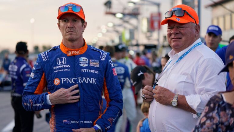 Scott Dixon, left, stands next to Chip Ganassi before a race at World Wide Technology Raceway on Aug. 21, 2021, in Madison, Ill. (Jeff Roberson/AP)