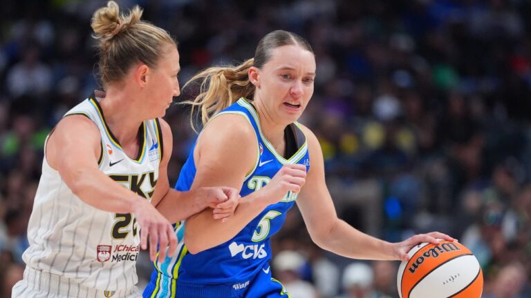 Dallas Wings' Paige Bueckers, right, drives against Chicago Sky's Courtney Vandersloot, left, during a game in Dallas, on Sunday, July 12, 2026. (LM Otero/AP)