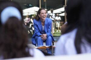 Britain's Kate, the Princess of Wales meets with children from Shine Camera Club, a creative photography programme based in the London Borough of Merton which supports children from disadvantaged backgrounds to develop confidence, creativity and self-expression through photography, during a visit on day four of the Wimbledon Tennis Championships in London, Thursday, July 2, 2026. (AP Photo/Andrew Matthews)