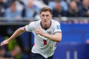 England's Elliot Anderson (8) runs with the ball during the World Cup Group L soccer match between England and Ghana in Foxborough, Mass., near Boston, Tuesday, June 23, 2026. (AP Photo/Dave Shopland)