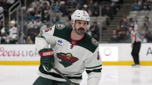 Minnesota Wild defenseman Jake Middleton (5) plays against the San Jose Sharks during the first period of an NHL hockey game, Wednesday, Dec. 31, 2025, in San Jose, Calif. (AP Photo/Godofredo A. Vásquez)