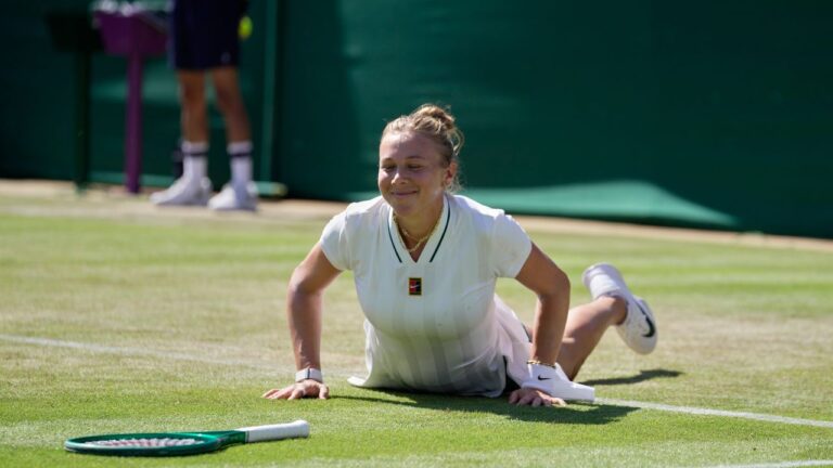 Amanda Anisimova of the United States gets up after falling down during a point against Sofia Kenin of the United States in their second round women's singles match at the Wimbledon Tennis Championships in London, Thursday, July 2, 2026. (AP Photo/Brian Inganga)
