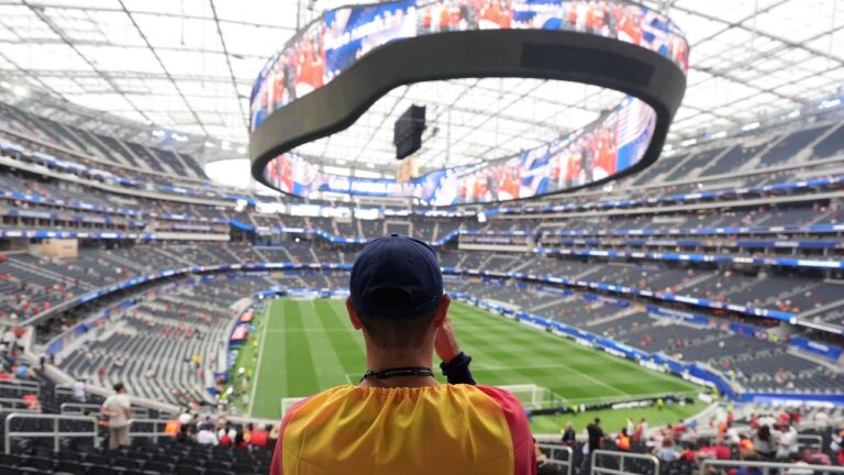 A fan of Spain waits for the World Cup round of 32 soccer match between Spain and Austria in Inglewood, Calif., near Los Angeles, Thursday, July 2, 2026. (AP Photo/Jae C. Hong)