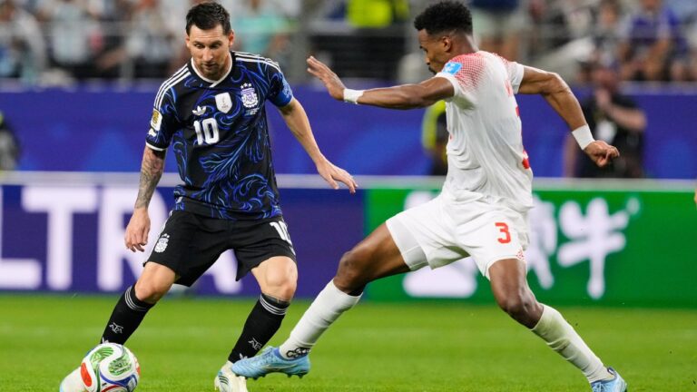 Lionel Messi and Noussair Mazraoui battle for the ball during the World Cup Group J match between Jordan and Argentina in Arlington, Texas, near Dallas on Saturday, June 27, 2026. (Tony Gutierrez/AP)