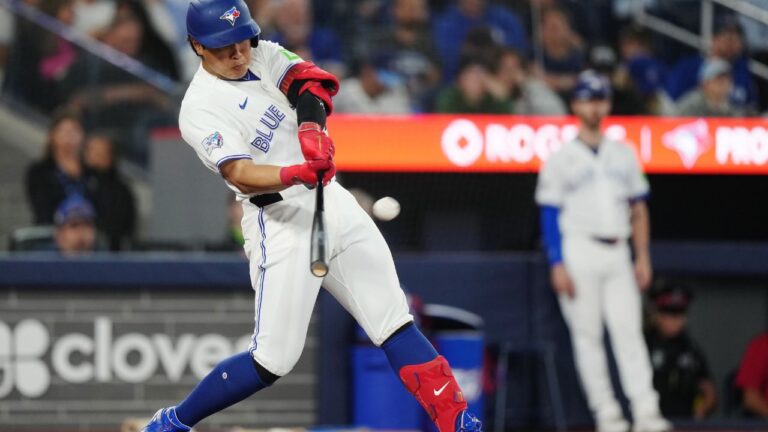 Toronto Blue Jays' Kazuma Okamoto hits a two-run home run against the Texas Rangers during ninth inning on Thursday, June 25, 2026. (Nathan Denette/CP)