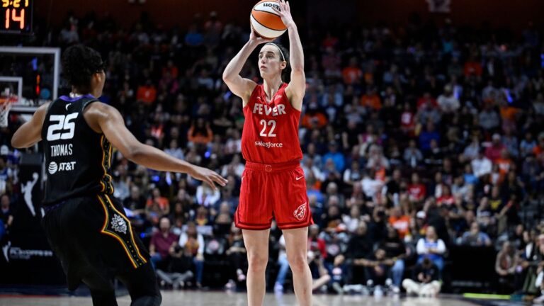 Caitlin Clark shoots over Alyssa Thomas during a first-round playoff game on Wednesday, Sept. 25, 2024, in Uncasville, Conn. (Jessica Hill/AP)