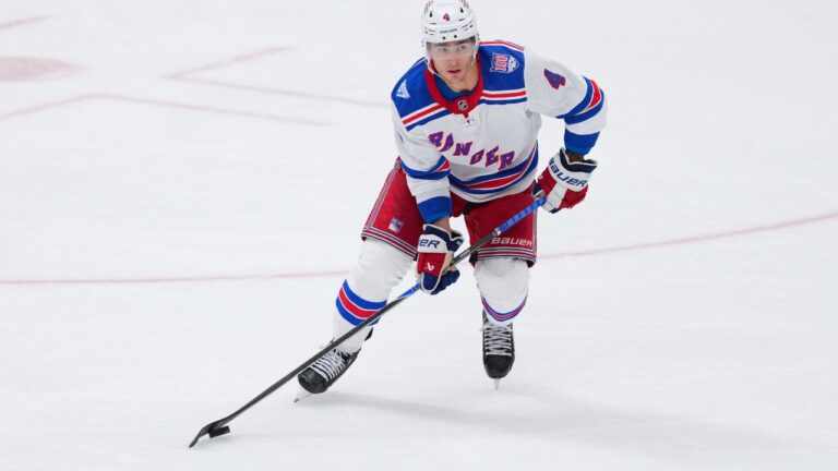 New York Rangers defenseman Braden Schneider (4) skates during the third period of an NHL hockey game between the Dallas Stars and the New York Rangers, Saturday, April 11, 2026, in Dallas. (AP Photo/Julio Cortez)