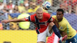 Norway's Erling Haaland (9) fights for the ball with Brazil's Gabriel Magalhaes (3) during the World Cup round of 16 soccer match between Brazil and Norway in East Rutherford, N.J., near New York, Sunday, July 5, 2026. (Adam Hunger/AP)