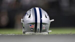 Dallas Cowboys helmet with Marshawn Kneeland's No. 94 on it prior to a game against the Las Vegas Raiders on Monday, Nov. 17, 2025, in Las Vegas. (David Becker/AP)