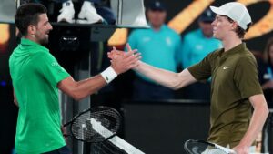 Novak Djokovic is congratulated by Jannik Sinner following their semifinal match at the Australian Open in Melbourne, Australia on Jan. 31, 2026. (Dita Alangkara/AP)