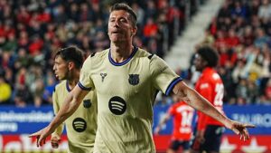 Robert Lewandowski celebrates after scoring during a La Liga match between Osasuna and Barcelona in Pamplona, Spain on Saturday, May 2, 2026. (Miguel Oses/AP)