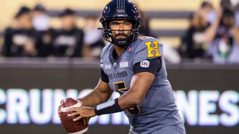 Hamilton Tiger-Cats quarterback Tre Ford looks for a pass during action against the Winnipeg Blue Bombers in Hamilton on Sunday, July 5, 2026. (Nick Iwanyshyn/CP)
