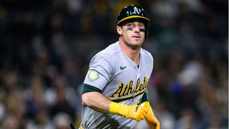 Athletics' Brent Rooker runs toward first base after hitting a flyout during the sixth inning of a baseball game against the San Diego Padres, Saturday, May 23, 2026, in San Diego. (William Liang/AP)