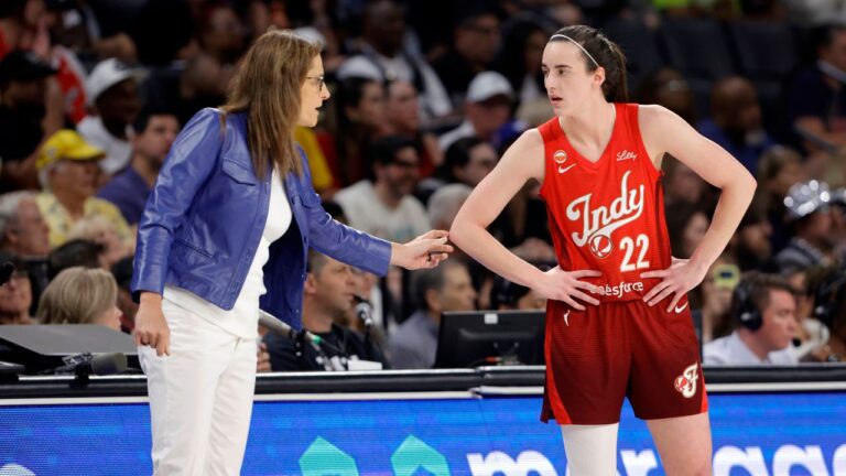Indiana Fever head coach Stephanie White talks with Indiana Fever guard Caitlin Clark (22) during the first half of an WNBA basketball game against the Las Vegas Aces Sunday, July 12, 2026, in Las Vegas. (Steve Marcus/AP)