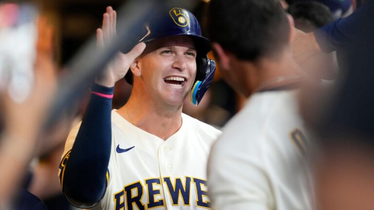 Cooper Pratt smiles in the dugout after scoring during the sixth inning of a game against the New York Mets, Monday, July 20, 2026, in Milwaukee. (Aaron Gash/AP)