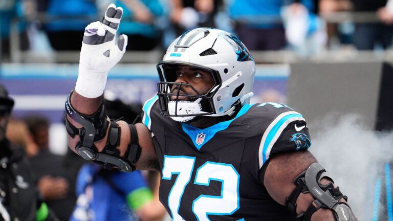 Carolina Panthers' Taylor Moton is introduced before a playoff game against the Los Angeles Rams, Saturday, Jan. 10, 2026, in Charlotte, N.C. (Jacob Kupferman/AP)