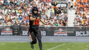 B.C. Lions' quarterback Nathan Rourke throws against the Edmonton Elks during CFL action in Kelowna, B.C., on Saturday July 4, 2026. (Steve Dunsmoor/CP)