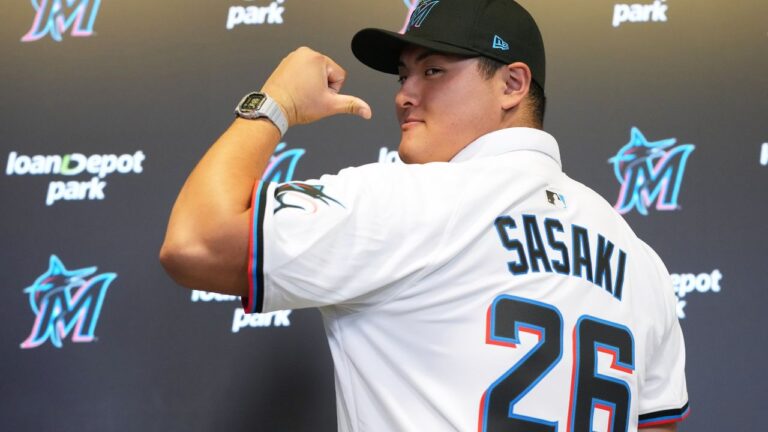 Rintaro Sasaki poses at a news conference after signing with the team, forgoing a professional career in Japan, Thursday, July 23, 2026, in Miami. (Lynne Sladky/AP)
