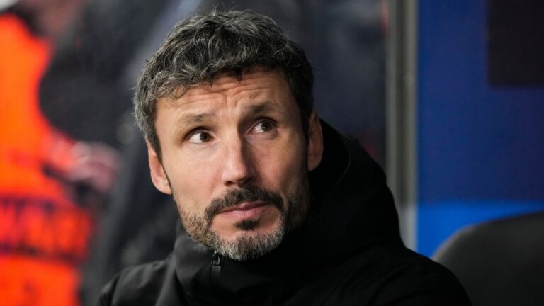 Mark van Bommel sits on the bench prior to a Champions League match between Shakhtar Donetsk and Antwerp in Hamburg, Germany, Tuesday, Nov. 28, 2023. (Martin Meissner/AP)