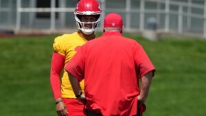 Kansas City Chiefs quarterback Patrick Mahomes talks with head coach Andy Reid during a practice Wednesday, June 10, 2026, in Kansas City, Mo. (Ed Zurga/AP)