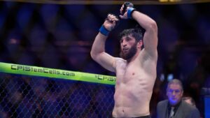 Magomed Ankalaev celebrates after defeating Alex Pereira in a UFC 313 mixed martial arts light heavyweight title bout Saturday, March 8, 2025, in Las Vegas. (John Locher/AP)
