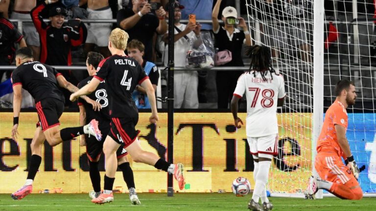 D.C. United offense Tai Baribo (9) celebrates after kicking a penalty kick past Toronto FC goalkeeper Luka Gavran, right, to take the lead during extra time in the second half of an MLS soccer match, Saturday, July 25, 2026, in Washington. (AP Photo/John McDonnell)
