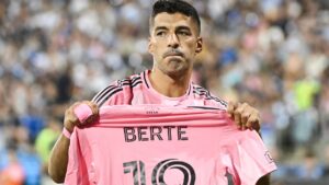 Inter Miami CF's Luis Suarez holds up the jersey of teammate German Berterame after scoring a penalty kick against CF Montreal during second half MLS soccer action in Montreal, on Saturday, July 25, 2026. Berterame was taking out of the game following an injury. (Graham Hughes/CP)