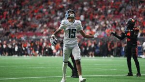 Toronto Argonauts' Makai Polk (15) celebrates his touchdown during the first half of a CFL football game against the B.C. Lions, in Vancouver, on Saturday, July 25, 2025. (Darryl Dyck/CP)