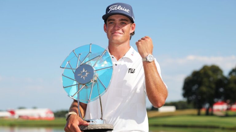 Jackson Koivun holds his trophy after winning the 3M Open golf tournament at the Tournament Players Club Sunday, July 26, 2026, in Blaine, Minn. (Bailey Hillesheim/AP)